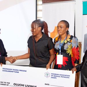 Oluchi Livinus, one of the 2025 winners of the Prof. T. A. Fregene Medical Physics Scholarship Award, presented with the award at the NAMP Conference, Enugu 2025.